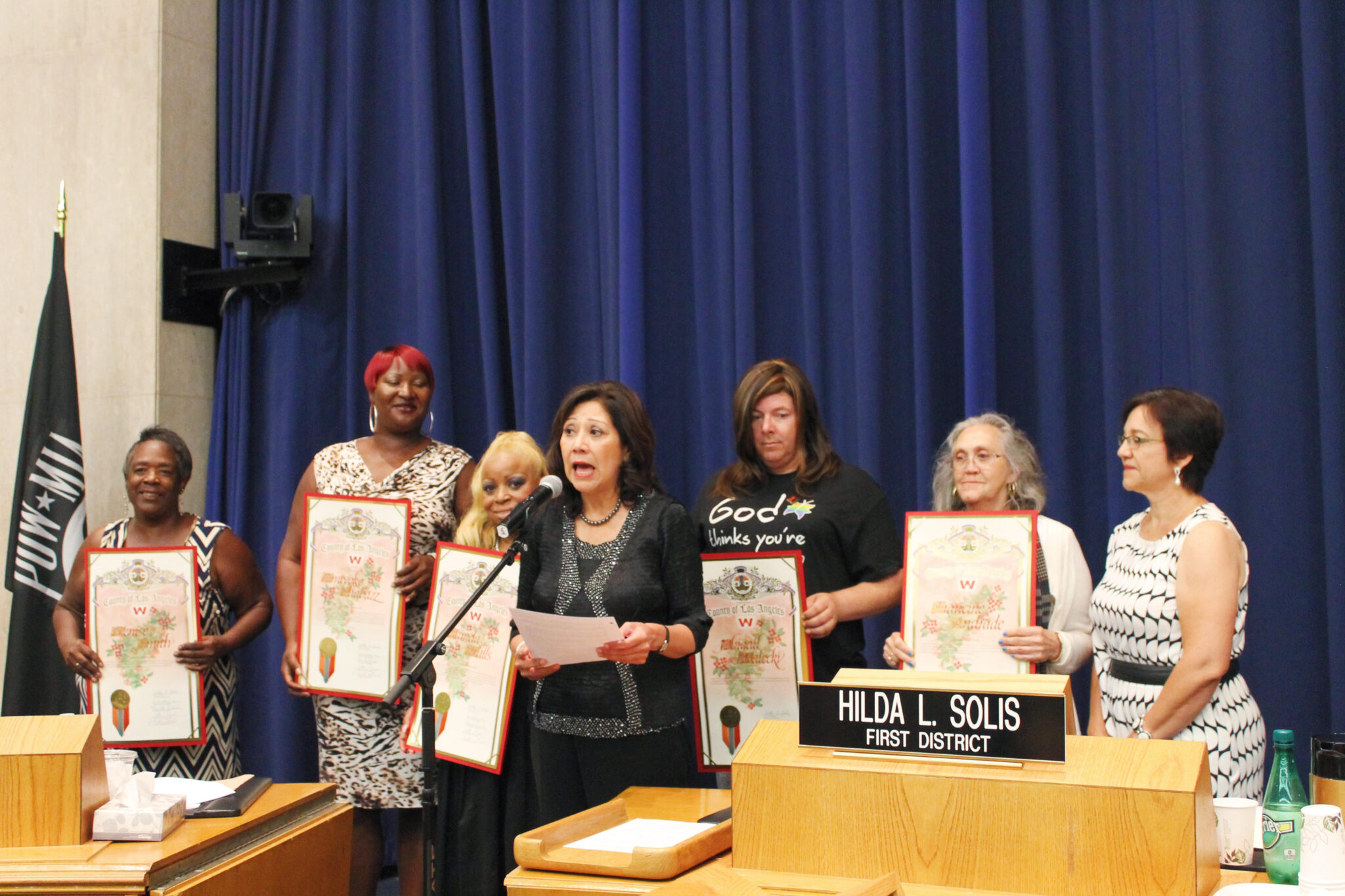 Supervisor Hilda Solis recognizes the advocacy work of each woman. From left to right: Denise Smith, Amiyoko Shabazz, Pamela Walls, Supervisor Solis, Abigail Malecki, Francine Andrade, DWC CEO Anne Miskey 